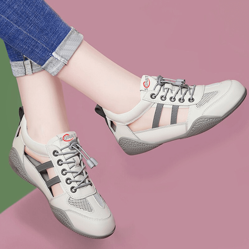 Soft-soled breathable casual flats running shoes with lace-up design on pink background.